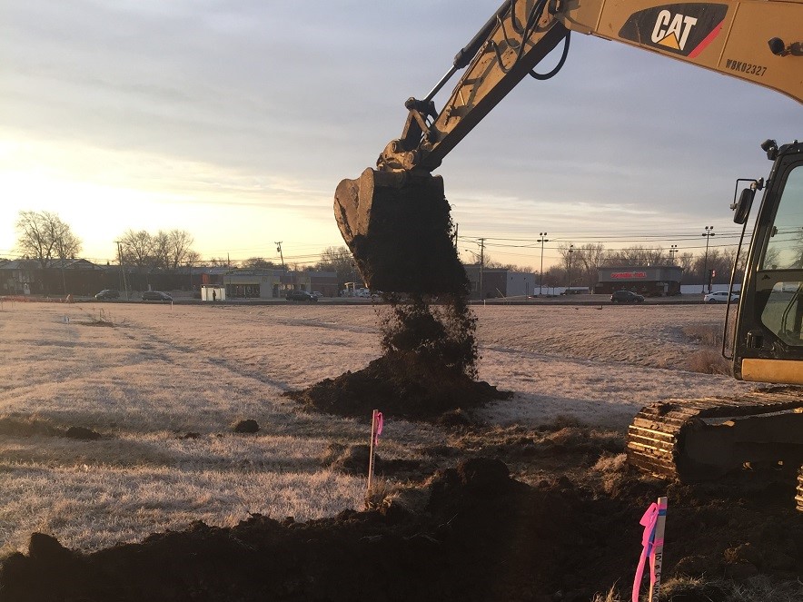 Excavator Digging Dirt
